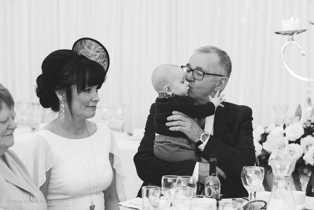 Black and white wedding photography of marquee reception during Irish garden party wedding at Ballyscullion Park Wedding Venue by Patrick Duddy Documentary Candid Wedding Photography