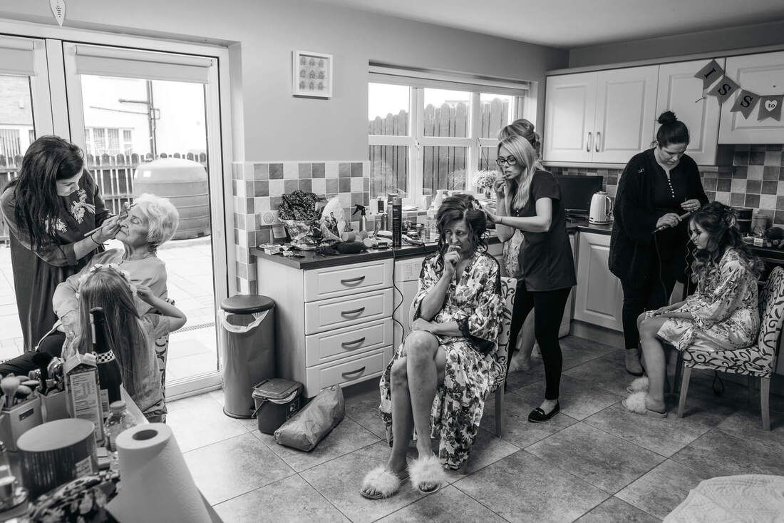 Three generations - bride, her mum & daughter having their hair & make up done on the morning of a Derry Donegal Wedding