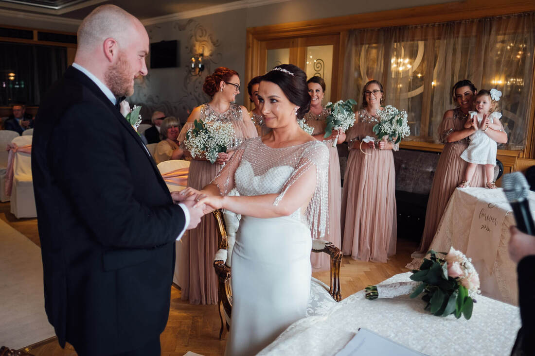 A natural and candid wedding photograph of Paddy & Nadine during their wedding - civil ceremony at Ballyliffin Lodge Hotel, County Donegal, Ireland by Patrick Duddy Wedding Photography based in Derry, Northern Ireland