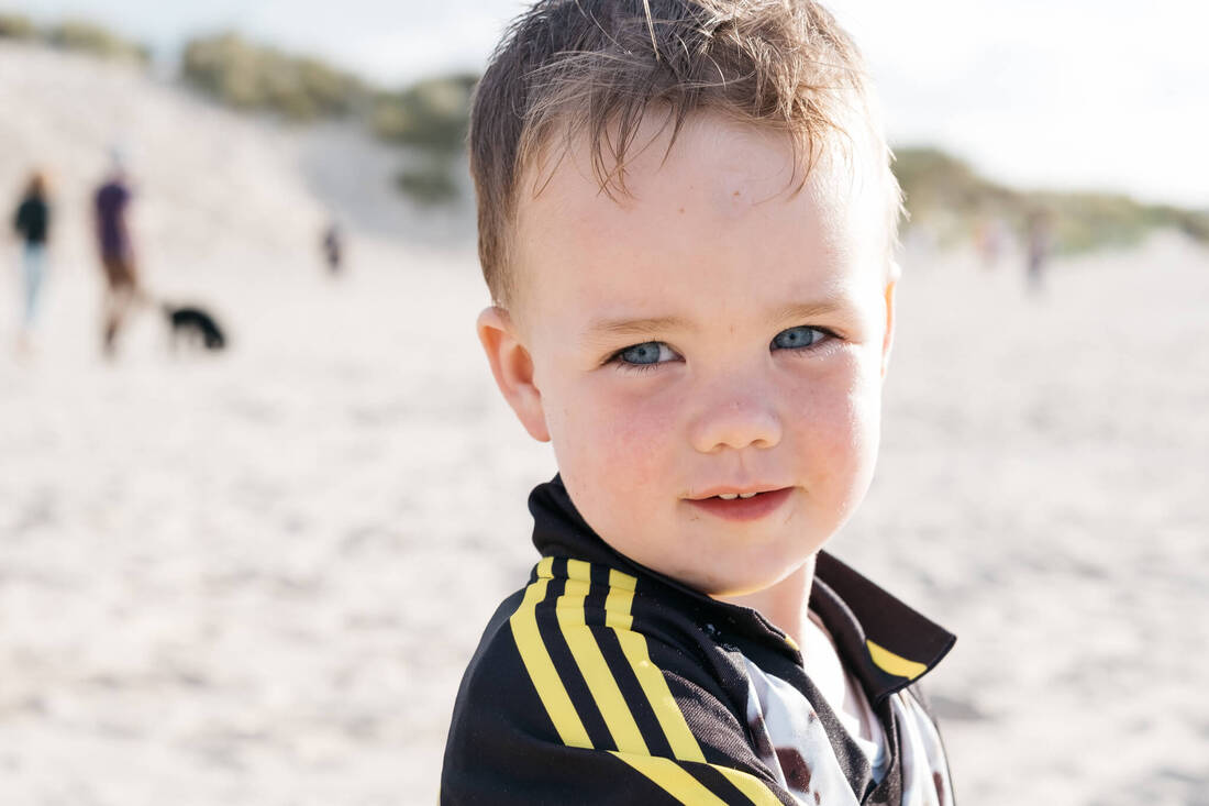 A young boy's Portrait on a Donegal Beach l by Patrick Duddy Photography