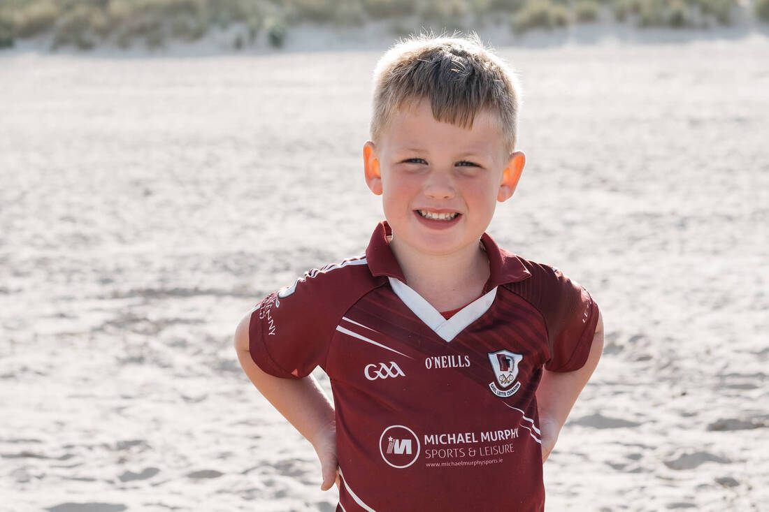 A boys Portrait on a Donegal Beach l by Patrick Duddy Photography