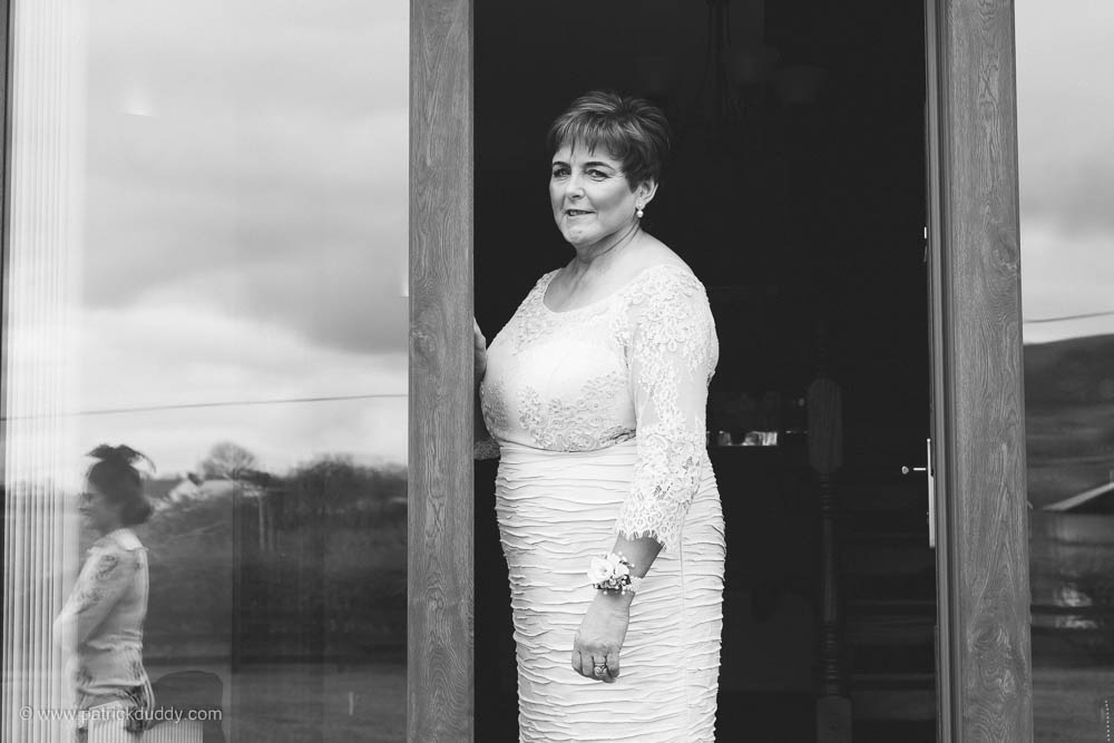 Black & white wedding photograph of Grooms mother at home before reception at Ballyscullion Park Wedding Venue by Patrick Duddy Candid Documentary Wedding Photography