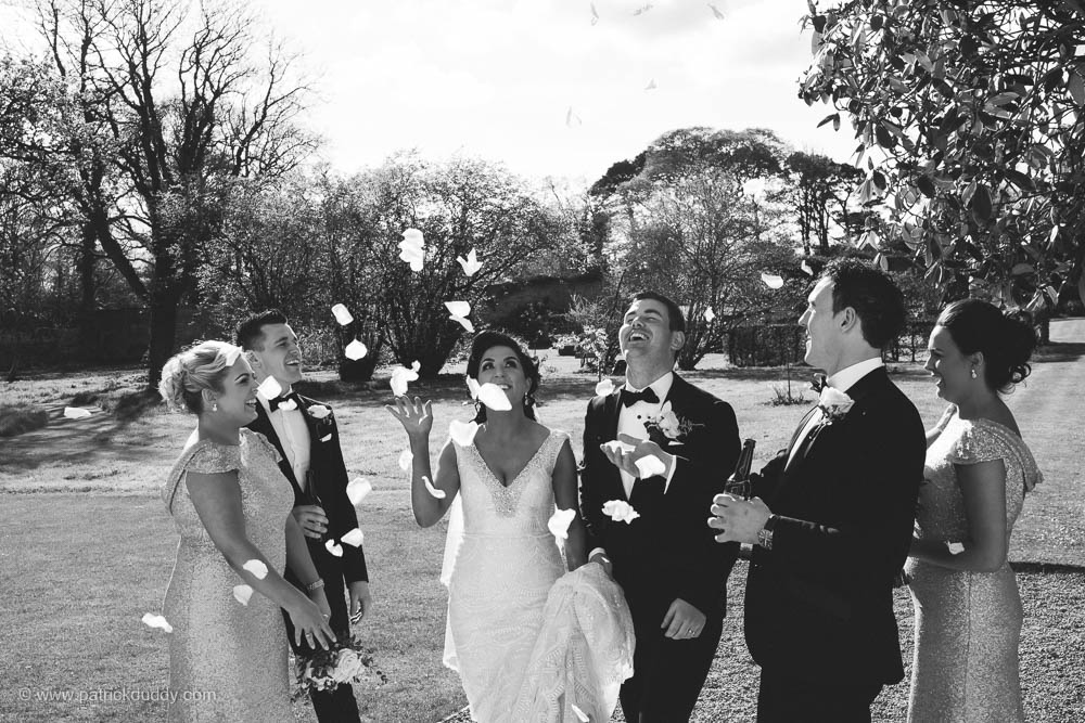 Black and white wedding photography of Bridesmaid at Irish garden party wedding at Ballyscullion Park Wedding Venue by Patrick Duddy Documentary Candid Wedding Photography