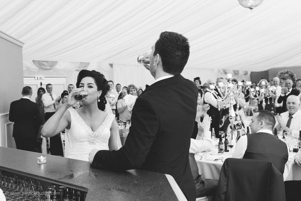 Black and white wedding photography of marquee reception during Irish garden party wedding at Ballyscullion Park Wedding Venue by Patrick Duddy Documentary Candid Wedding Photography