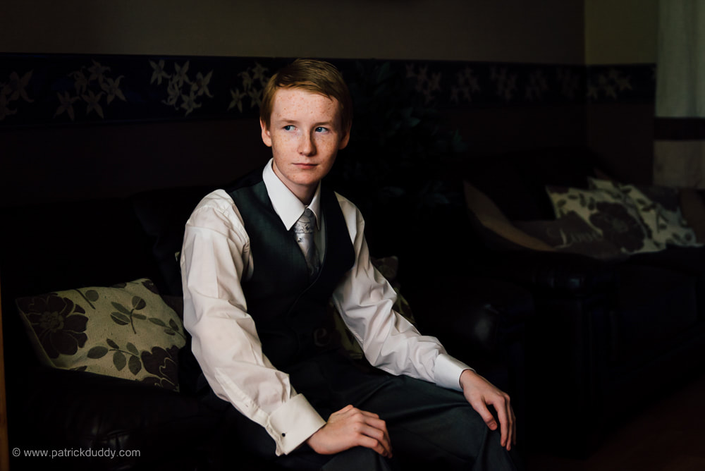 A Groomsman waiting for things to begin at a Buncrana & Ballyliffin Lodge Wedding