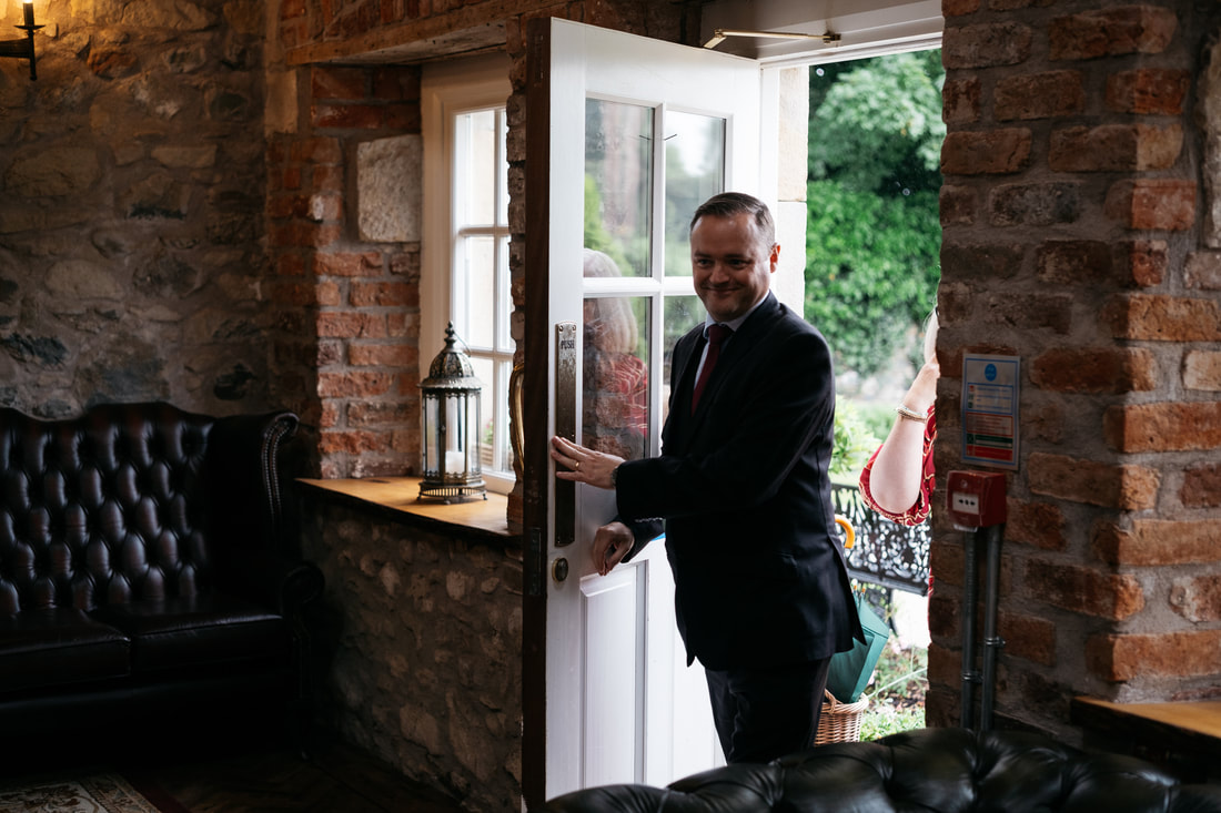 Documentary wedding photography from The Old Rectory, Killyman by Patrick Duddy Photography - a wedding guest arrives